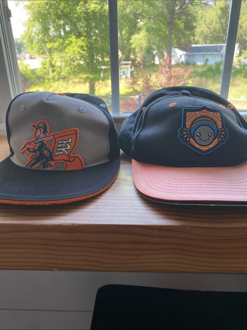 Two Kindly Keyin Orange and Black Snapback Hats - Graphic Emblems